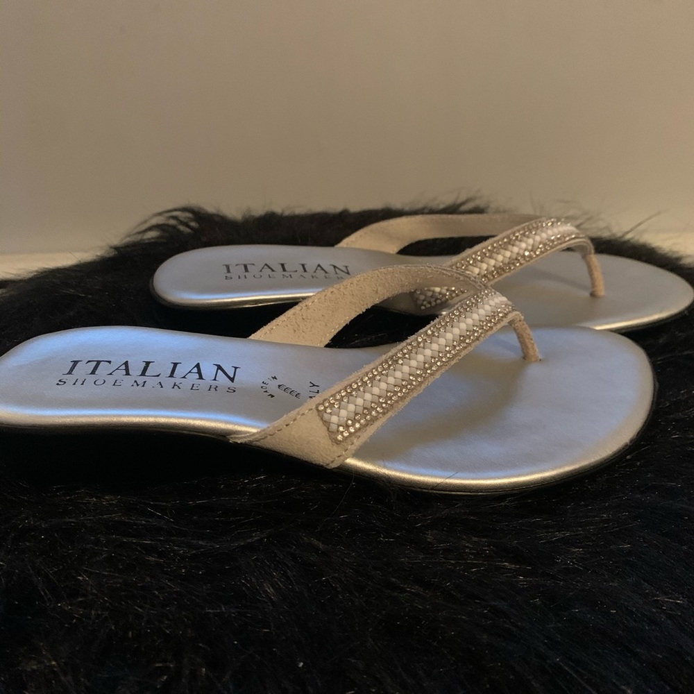 Silver flip-flops with raised heel